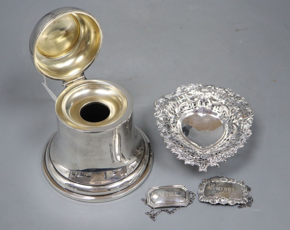 A George V silver bell shaped inkwell(no insert), Birmingham, 1919, 15cm, A Victorian pierced silver bonbon dish & 2 labels.
